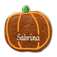 A pumpkin made of gingerbread decorated with sugar frosting