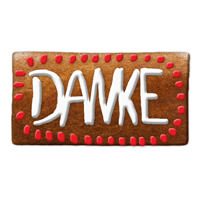 A gingerbread rectangle with decoration made of frosting