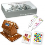 Small gingerbread house kit for handicrafts in printed advertising packaging, maxi letter format