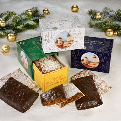 Mood image of assorted Lebkuchen varieties with packaging and Christmas tree decorations
