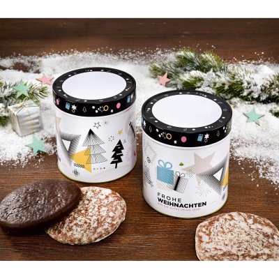Two Christmas Gift Tins Surrounded by Nuremberg Elisen Gingerbread Cookies and Christmas Decorations