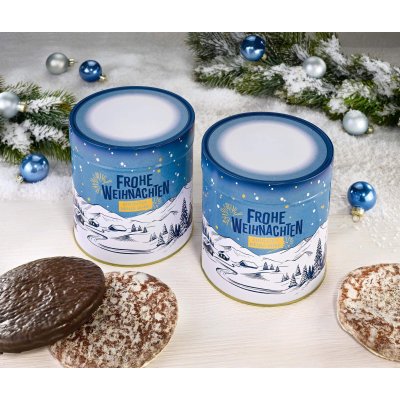 Zwei Lebkuchen Geschenkdosen umgeben von Nürnberger Elisen Lebkuchen und Weihnachtsdekoration