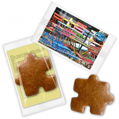 Puzzle aus Lebkuchen, mit Werbekarte im Flowpack