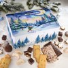 “Christmas Eve” gingerbread chest surrounded by Lebkuchen, confectionery, and Christmas cookies